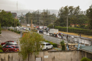 Two Nakuru city comparative photos of Mwaura Gathua, one of when he started photography and the other a recent photo that he took 